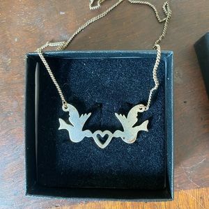 silver bird and heart necklace